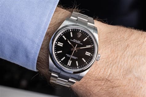 gold silver rolex black face|Rolex Oyster Perpetual 41 watch: Oystersteel .